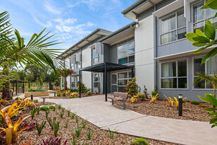 a footpath for aged care residents to walk through a well kept garden at the gracewood aged care home in kellyville hills district
