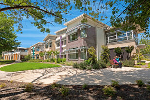 a paved footpath leading into the two story baptistcare griffith aged care home nursing home in griffith act